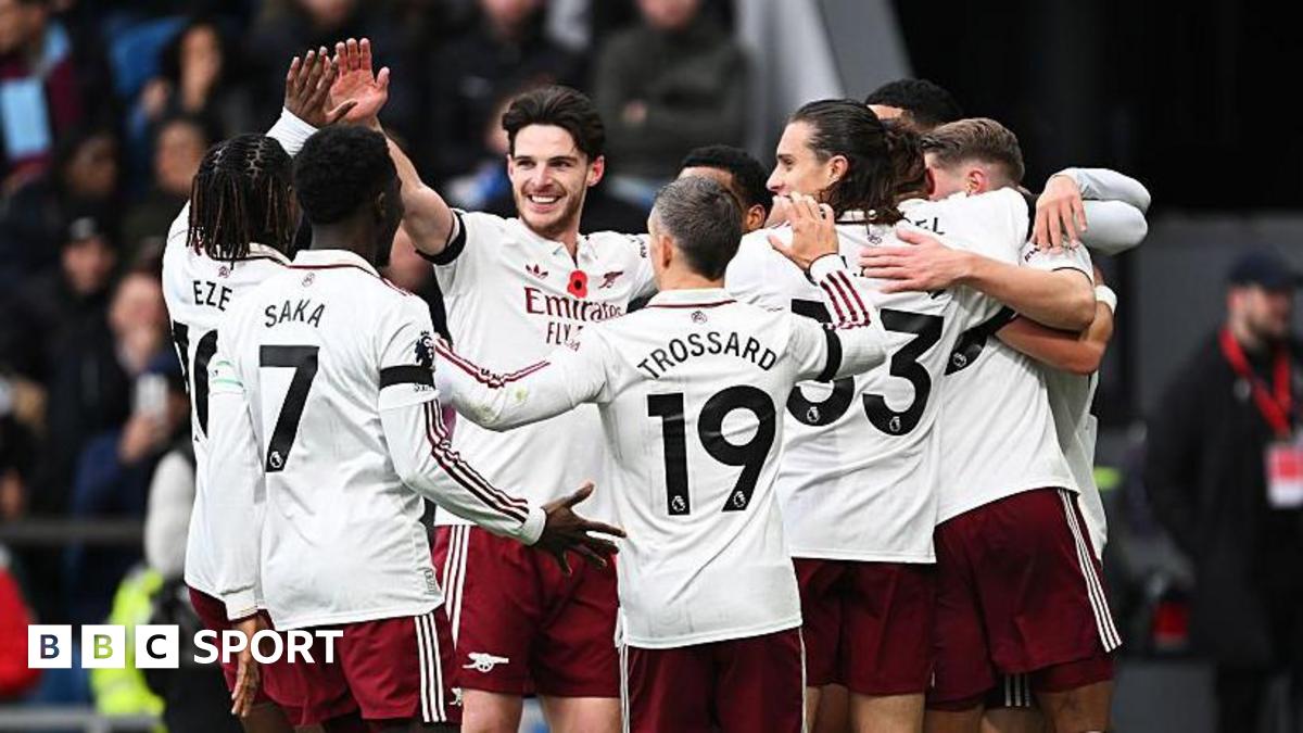 Arsenal players celebrate scoring against Burnley