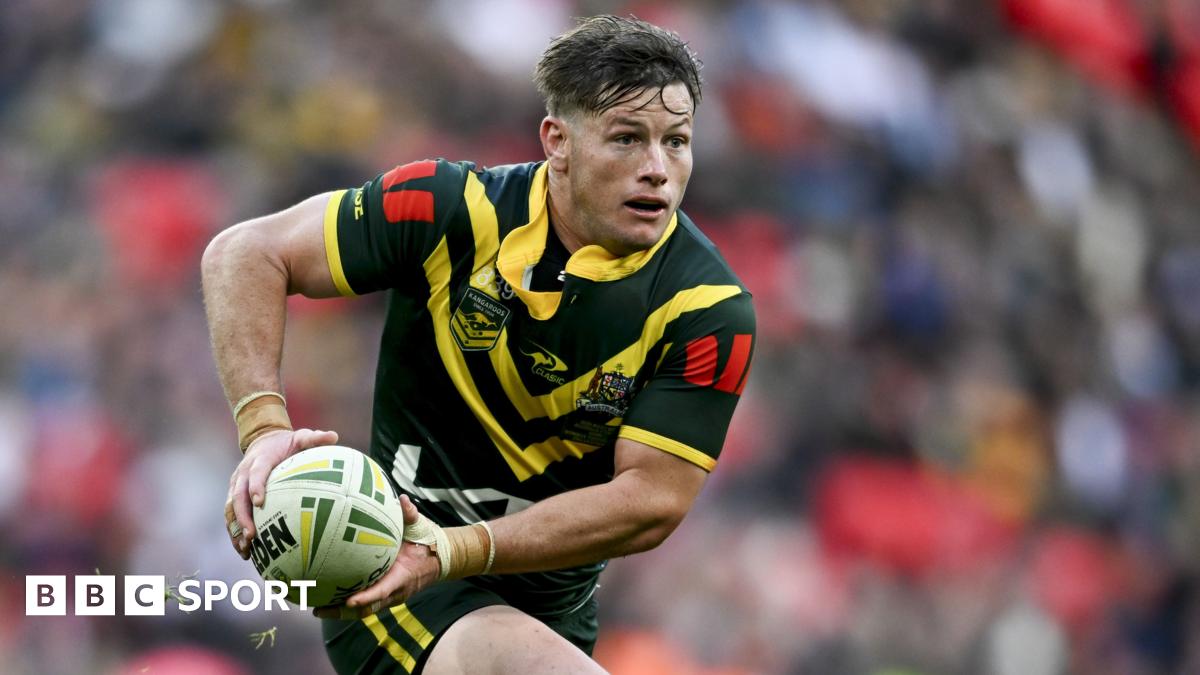 Harry Grant carries the ball