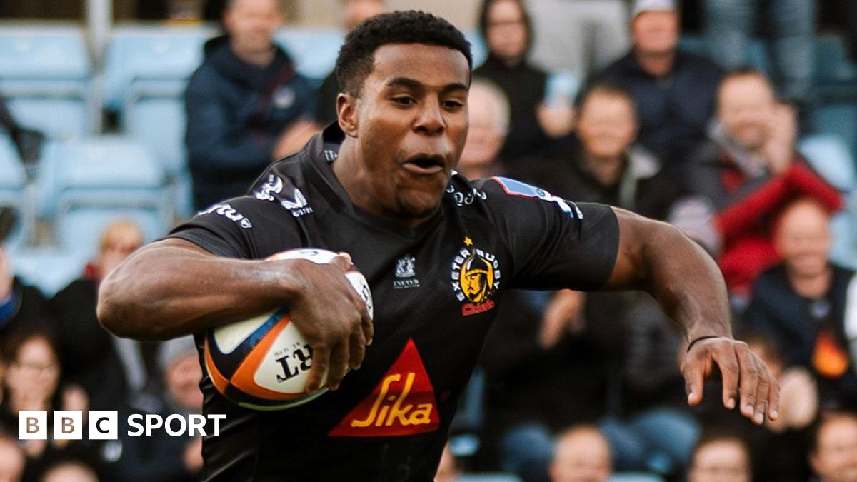 Immanuel Feyi-Waboso dives over for his hat-trick try for Exeter