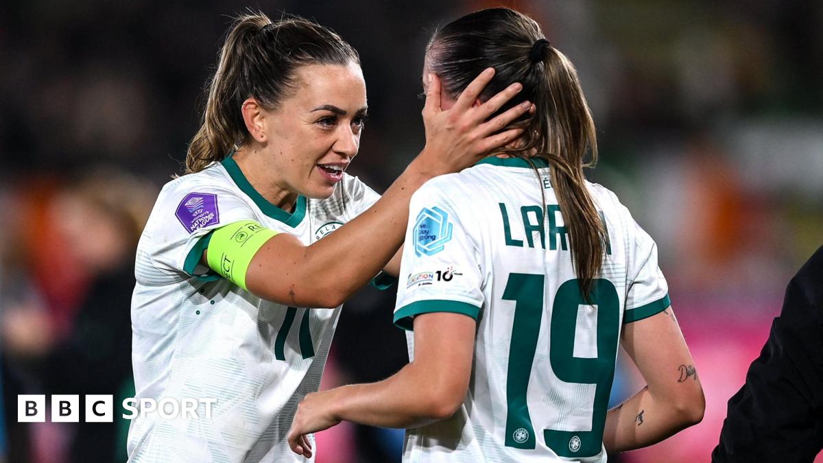 Katie McCabe celebrates with Abbie Larkin