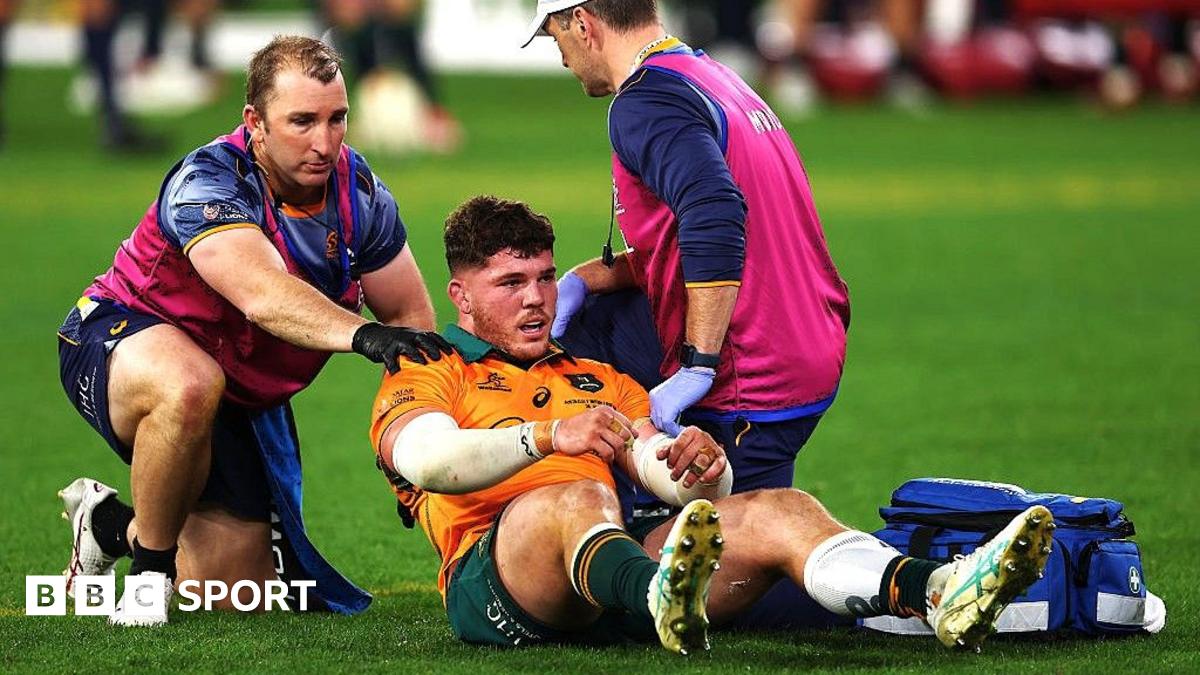 Carlo Tizzano being tended to by medics