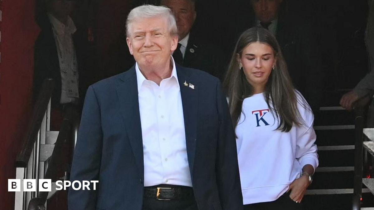 US President Donald Trump, along with his granddaughter Kai Madison Trump, attends the 2025 Ryder Cup
