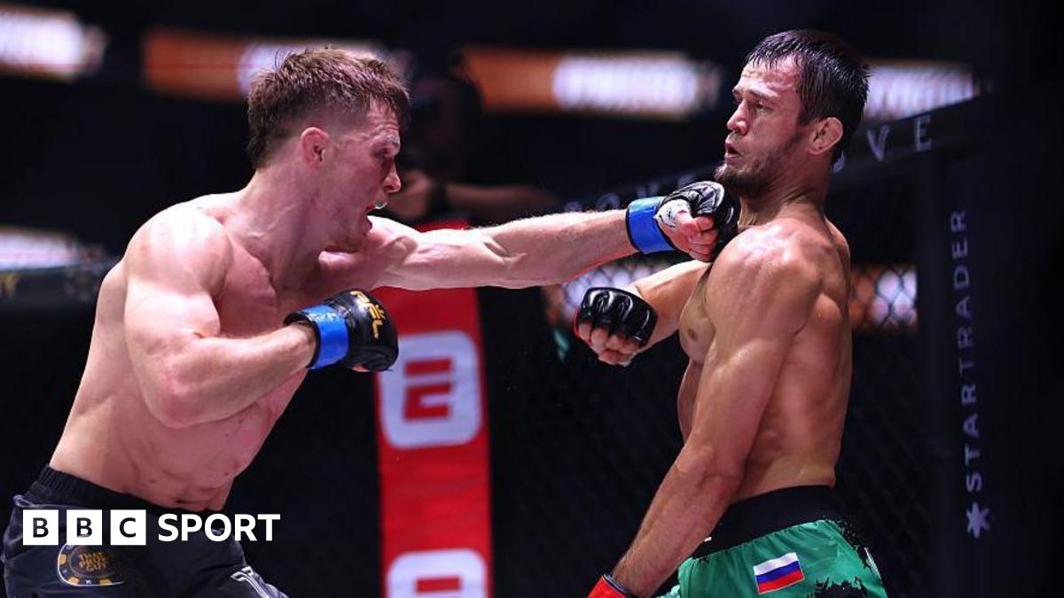 Paul Hughes punches Usman Nurmagomedov