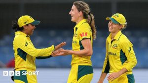 Australia players Alana King (left), Annabel Sutherland (middle) and Phoebe Litchfield celebrate a wicket v England
