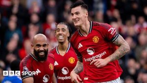 Manchester United striker Benjamin Sesko (right) celebrates his goal against Sunderland at Old Trafford
