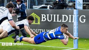 Cameron Redpath dives over to score a try