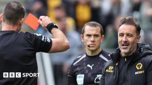 Wolves manager Vitor Pereira is shown a red card