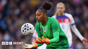 Khiara Keating catching the football on her England debut