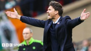Referee Nick Walsh shows Celtic
