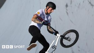 Dylan Hessey performs a trick on his BMX bike