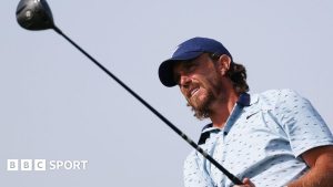 Tommy Fleetwood watches a shot
