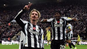 Nick Woltemade celebrates with Anthony Elanga as he scores for Newcastle United against Tottenham