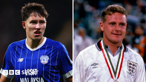 On the left, Rubin Colwill on blue short of Cardiff City. On the right is Paul Gascogne in white shirt of England and wearing a medal.