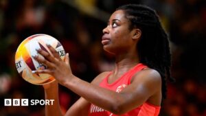 Liv Tchine lines up a shot while playing for England