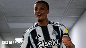 Malick Thiaw celebrates after Newcastle United