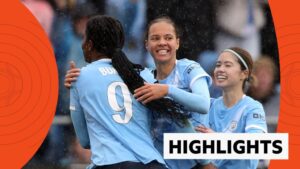 Bunny Shaw celebrates scoring with her Manchester City teammates