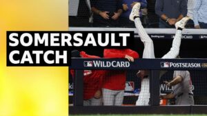 Ryan McMahon flipped upside down in dugout while catching ball